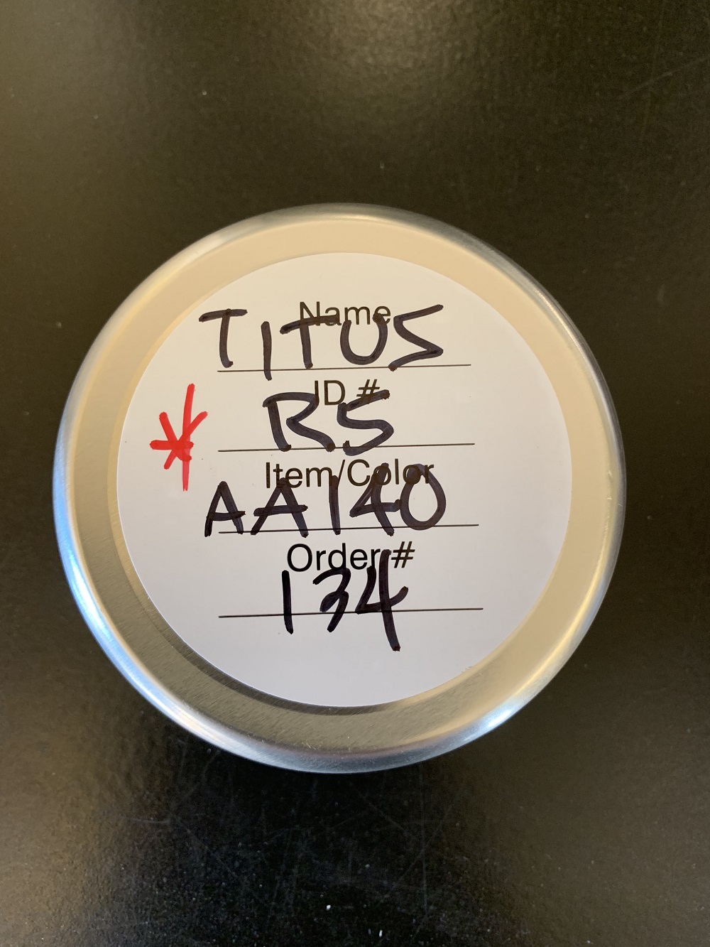 A jar with some writing on it