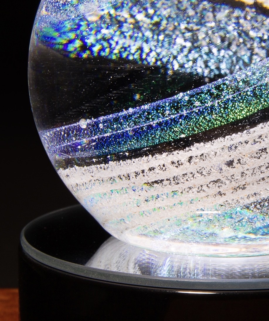 A close up of the bottom of a glass ball