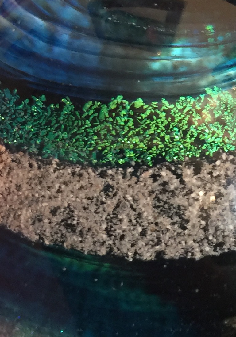 A close up of the bottom of a jar