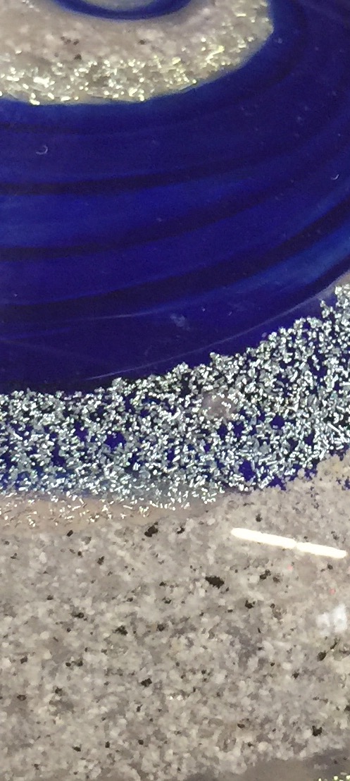 A close up of some glass on the ground