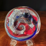 A glass plate with some swirls and other designs